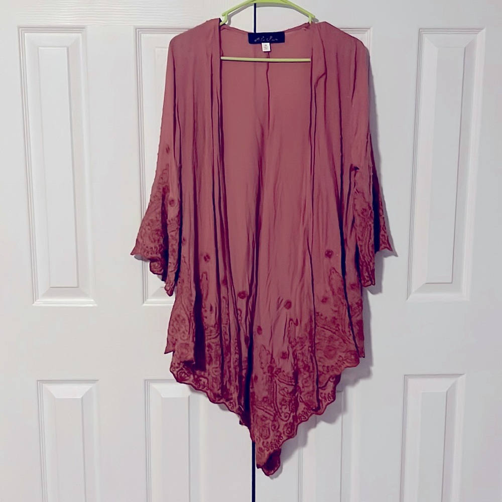 Faded pink coverup.
